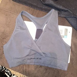 Alphalete surface laser cut wrap bra